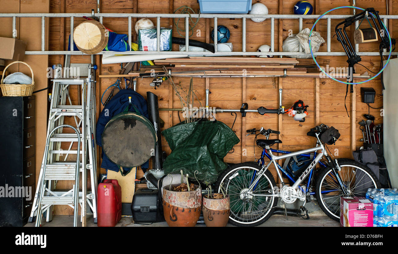 Cluttered interior garage storage. Stock Photo