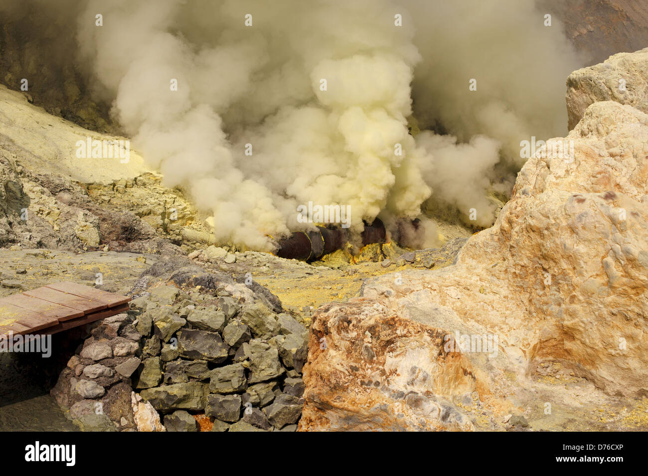 Ijen volcano crater sulfur mining Stock Photo