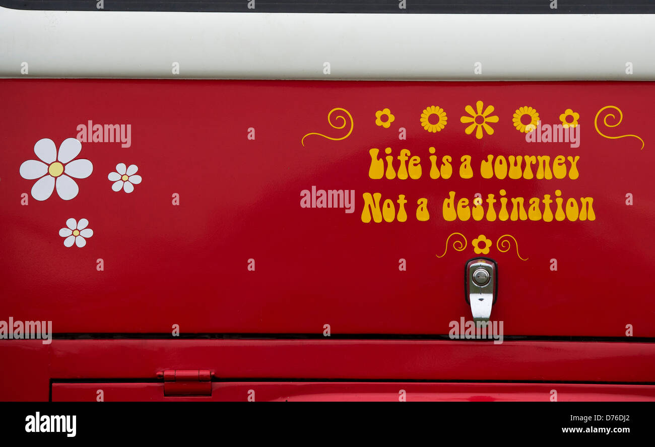 VW Volkswagen camper van rear end with 'Life is a journey not a destination' stickers Stock Photo