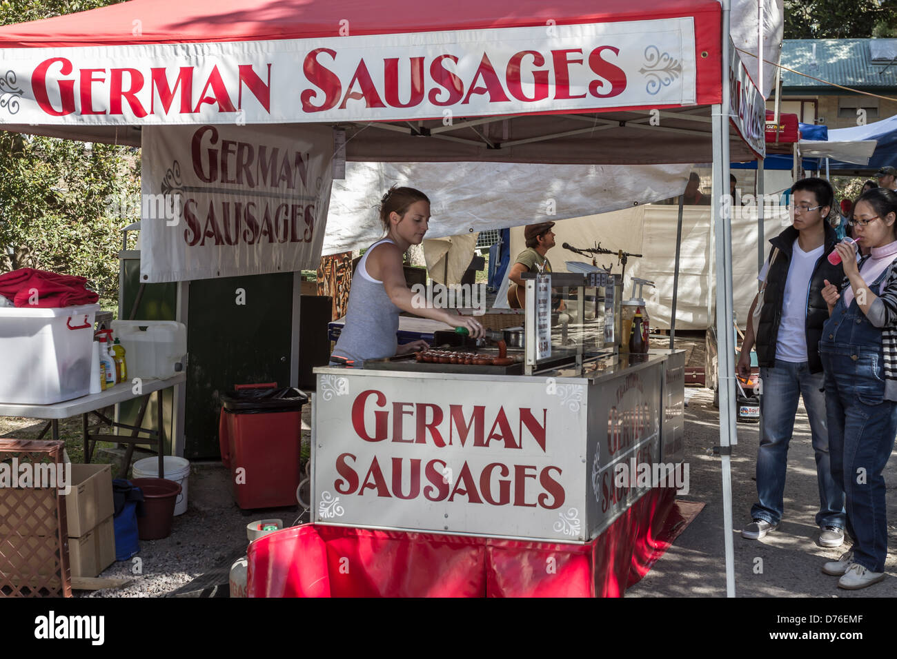 Eumundi Market stall selling German Sausages Stock Photo