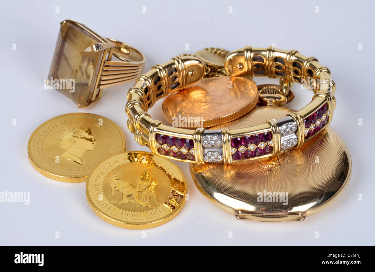 Jewellery pocket watch golden coins Stock Photo