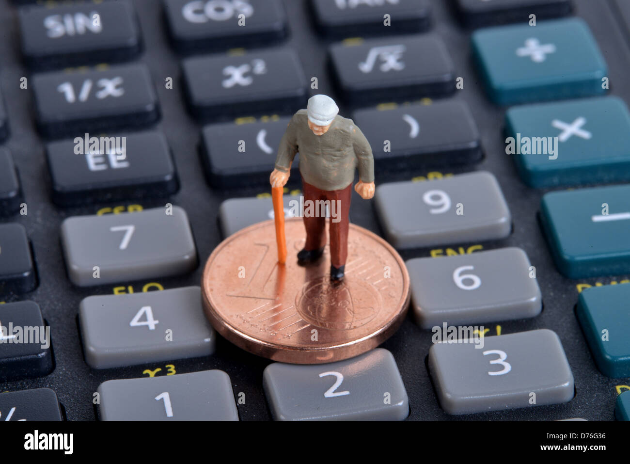 Symboldbild pensioner Miniaturfigur money pocket calculator Stock Photo