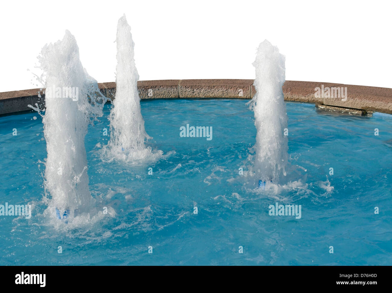 water scenery with 3 small fountains in white back Stock Photo