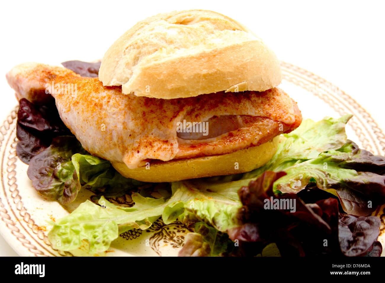 Chickens thigh spicy on roll and Stock Photo Alamy