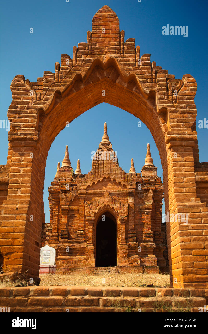 Scene in an archway - Tayokepyay Temple in Bagan, Myanmar 2 Stock Photo