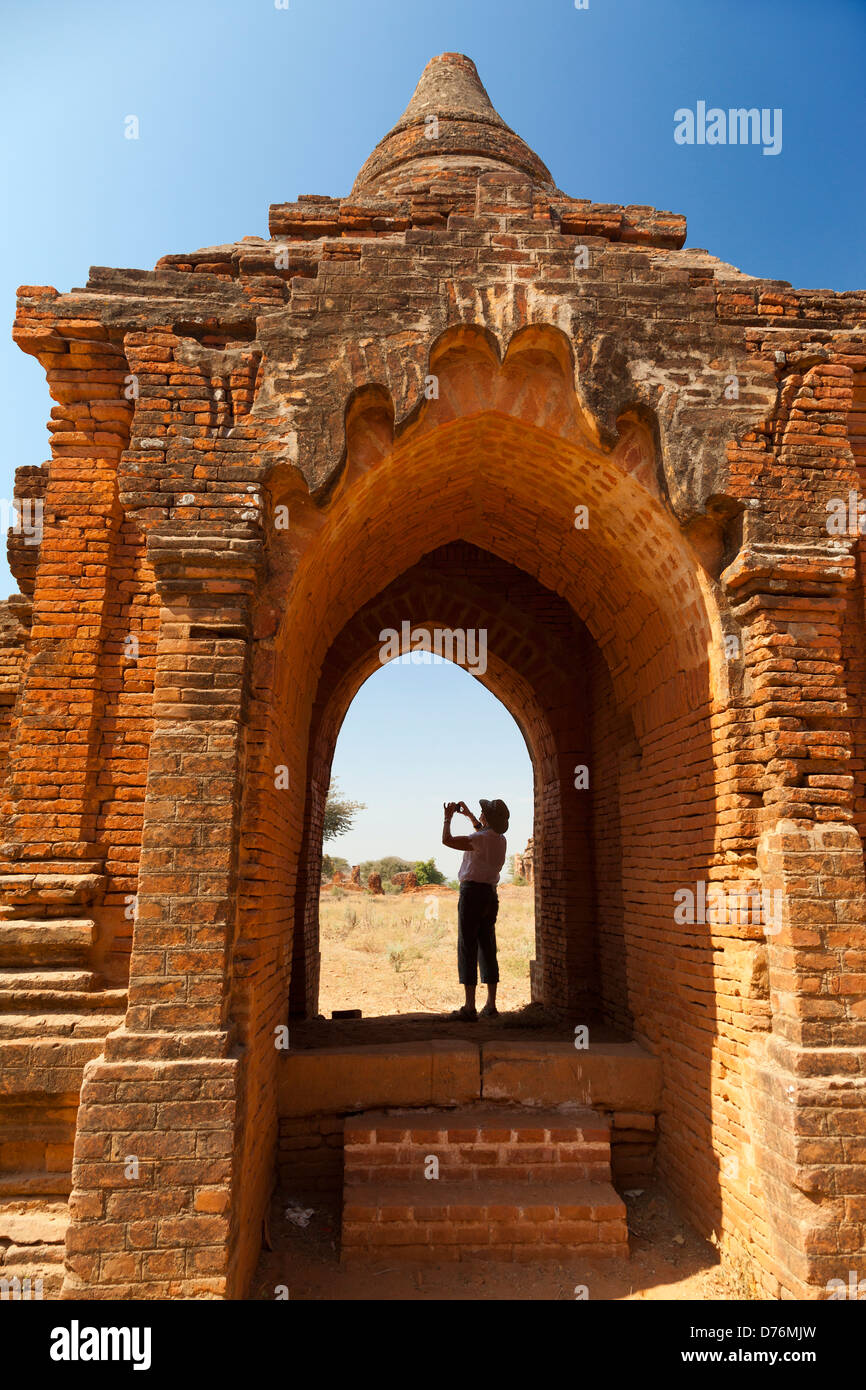 Scene in an archway - Tayokepyay Temple in Bagan, Myanmar 4 Stock Photo