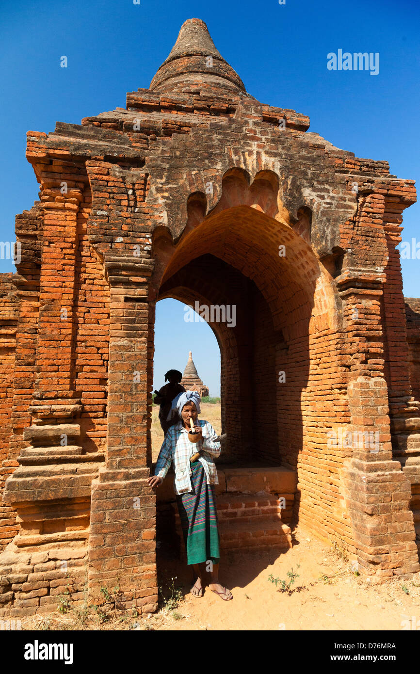 Scene in an archway - Tayokepyay Temple in Bagan, Myanmar Stock Photo
