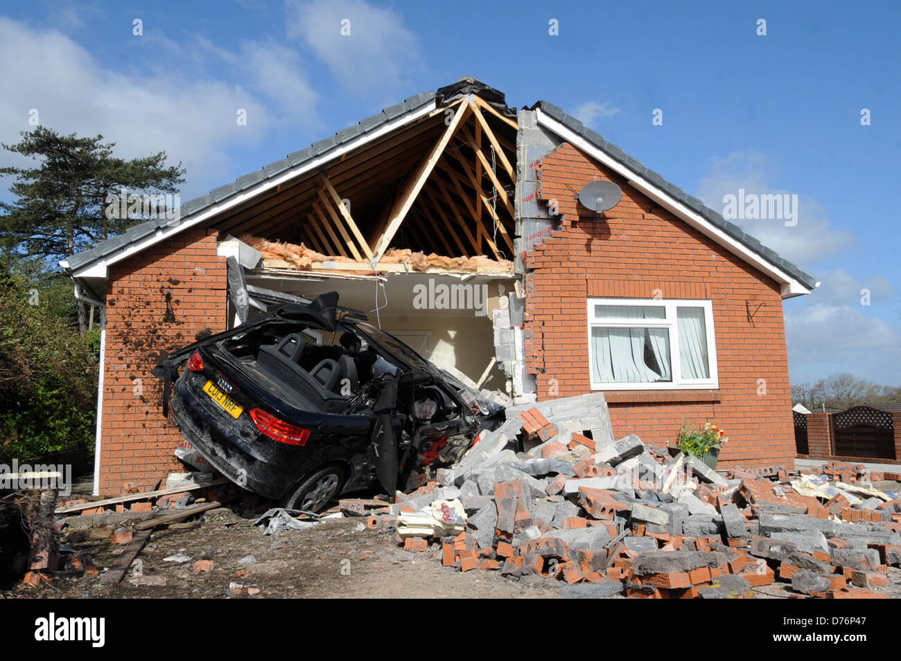 Gowerton, UK. 29th April 2013  The scene of an accident in which a bungalow belonging to Marianne Heath in Gowerton, near Swansea, UK, was partially destroyed by a brand new Audi convertible car that plunged into the lounge whilst she was having breakfast in the kitchen. Credit:  D Legakis / Alamy Live News Stock Photo