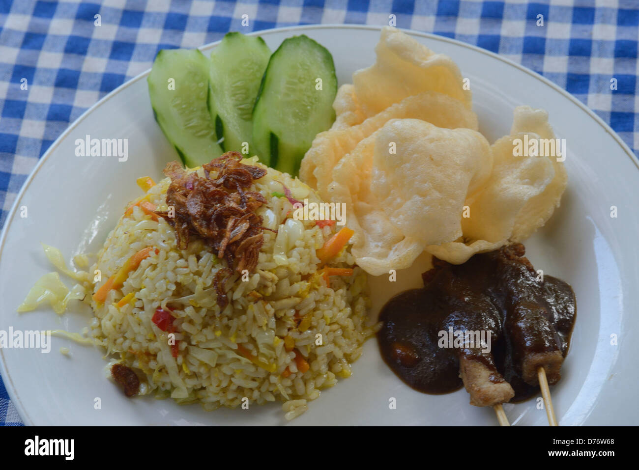 Indonesia; Bali, traditional dish with satay kebab served in a