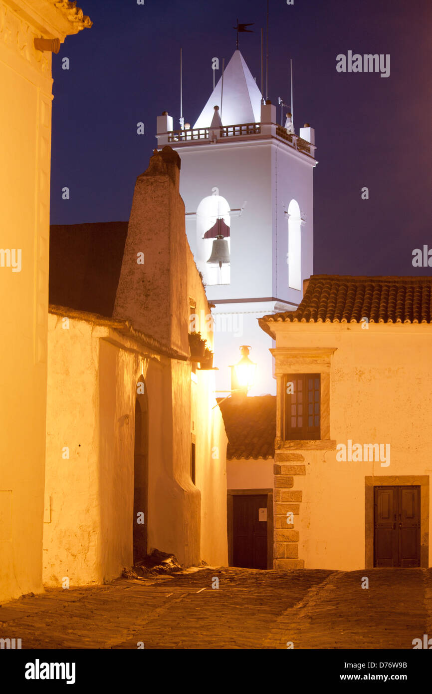 Torre de Relogio and Rua Direita twilight / dusk / evening / night view of street in Monsaraz village Alentejo Portugal Stock Photo