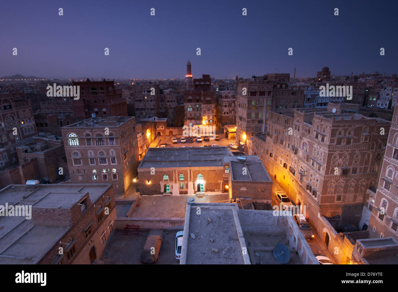 City lights at night in the old city of Sana'a Stock Photo