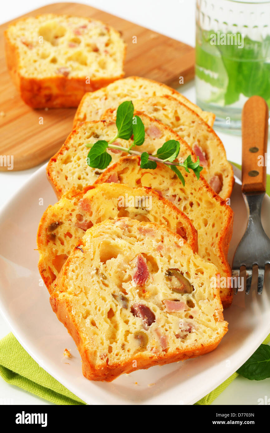 Slices of savory ham and olive cake Stock Photo Alamy