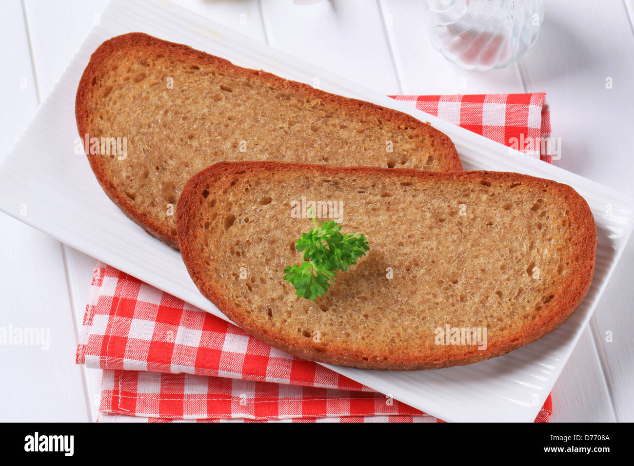 Slices of pan fried bread with garlic and salt Stock Photo Alamy