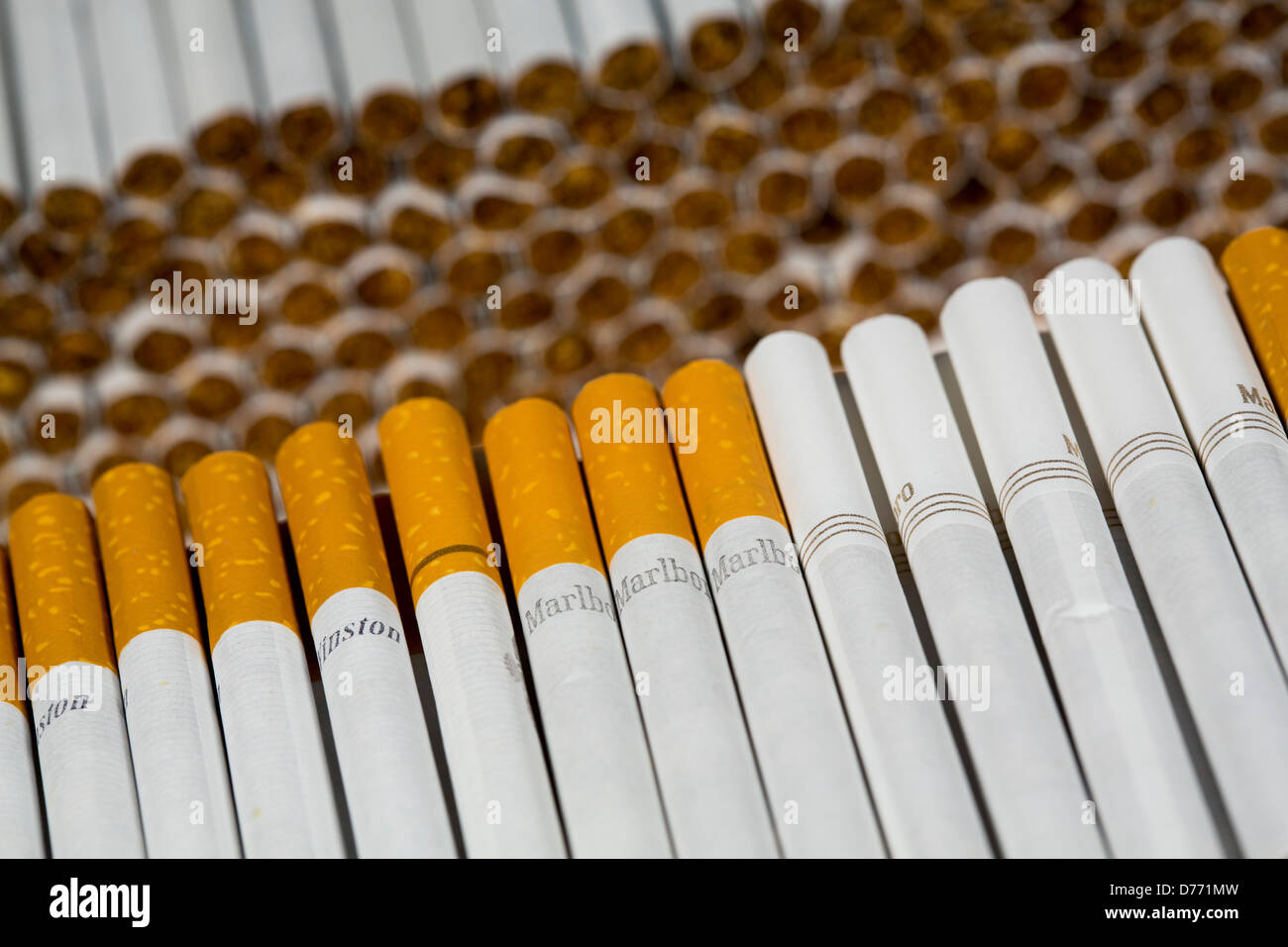 Various loose cigarettes. Marlboro, Pall Mall, Winston, Camel, Parliament,  Newport, American Spirit Stock Photo