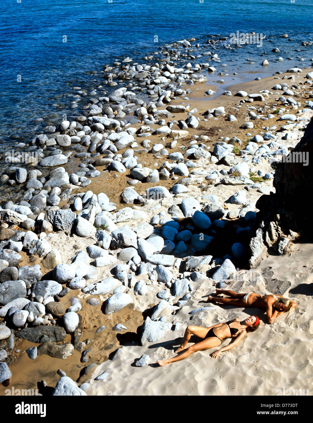 8699. Sunbathing near Myrina, Lemnos, Greece, Europe Stock Photo