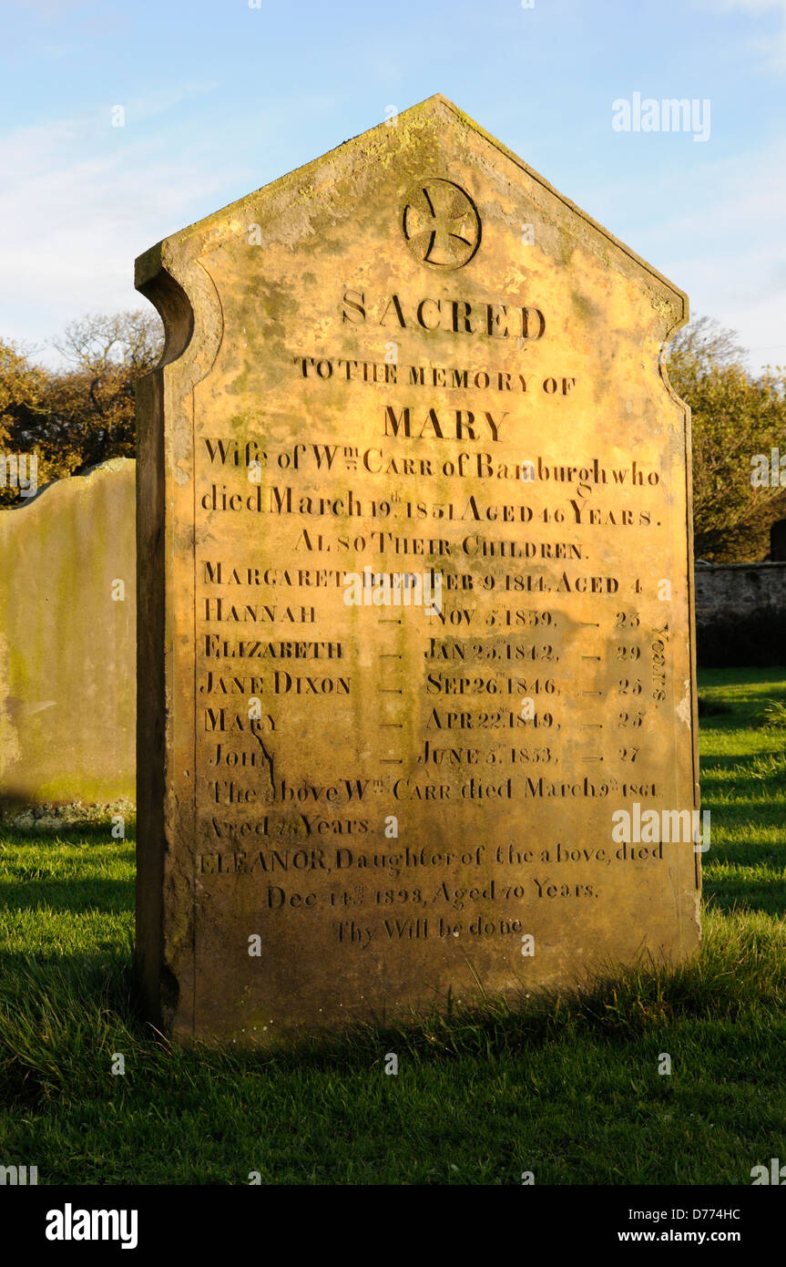 Gravestone of a family whose children died young in Bamburgh churchyard Stock Photo