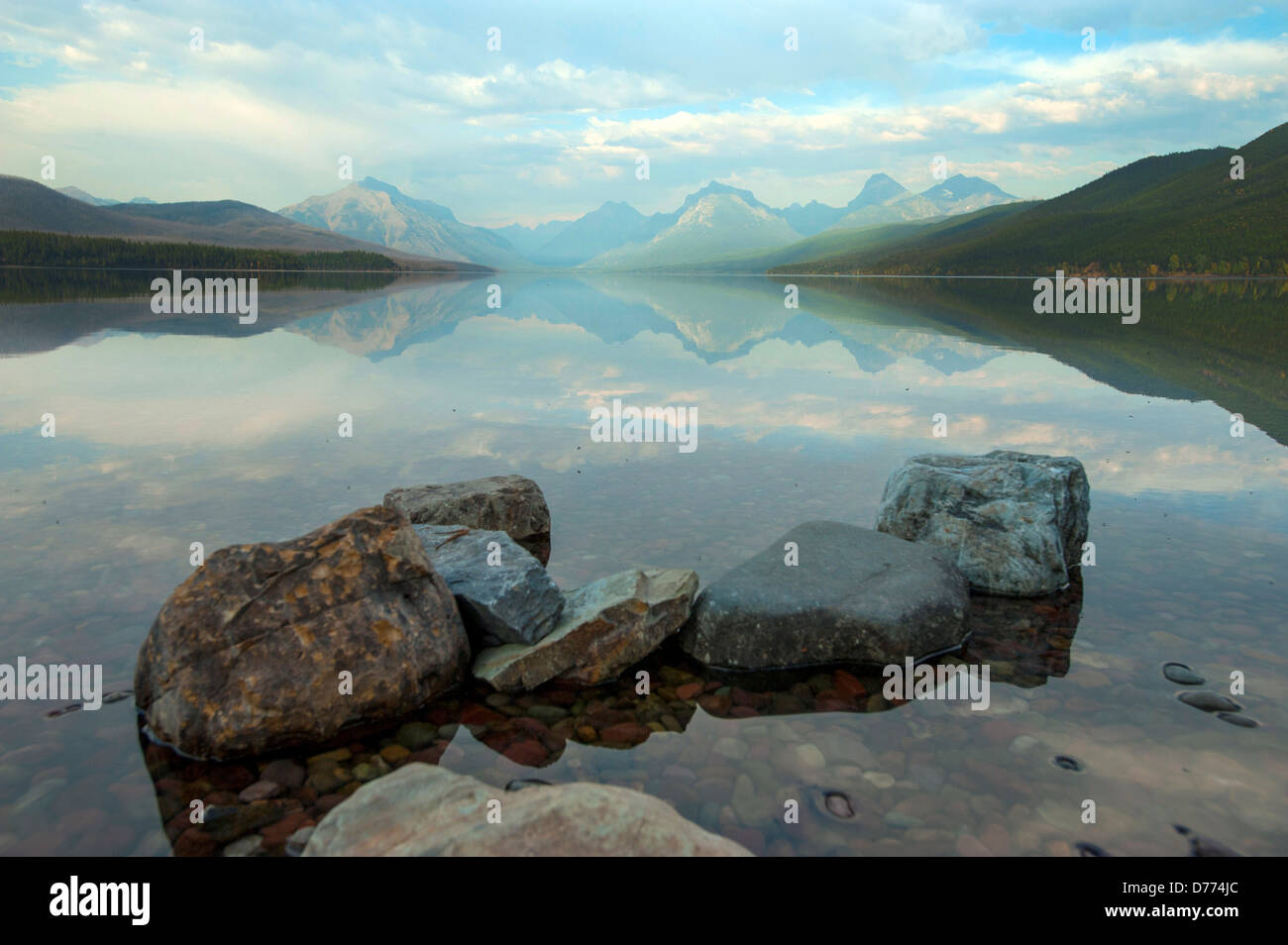USA Montana Glacier National Park Landscape stones on shore Lake MacDonald Stock Photo