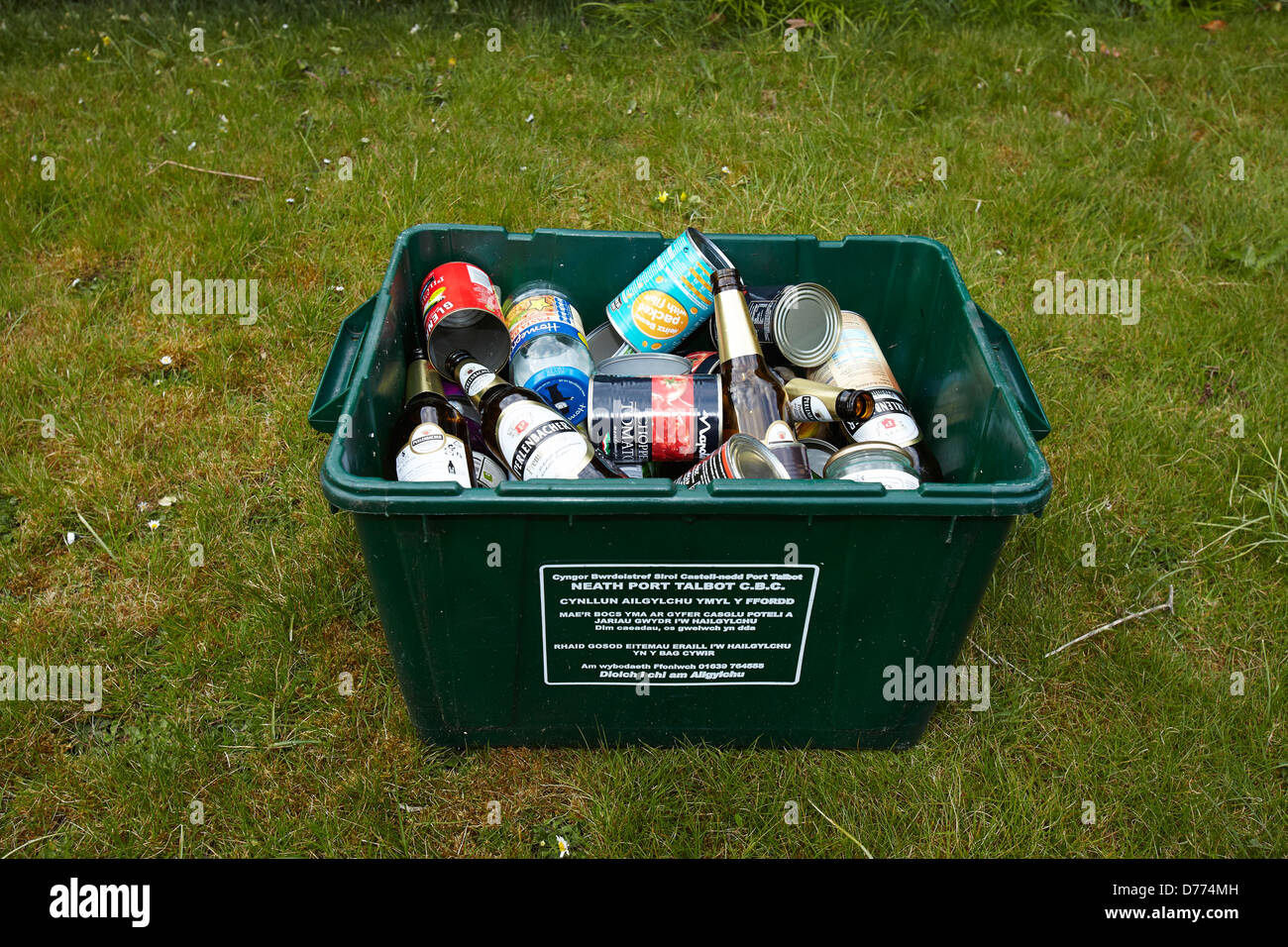 Glass bottles tin cans recycle bin hires stock photography and images