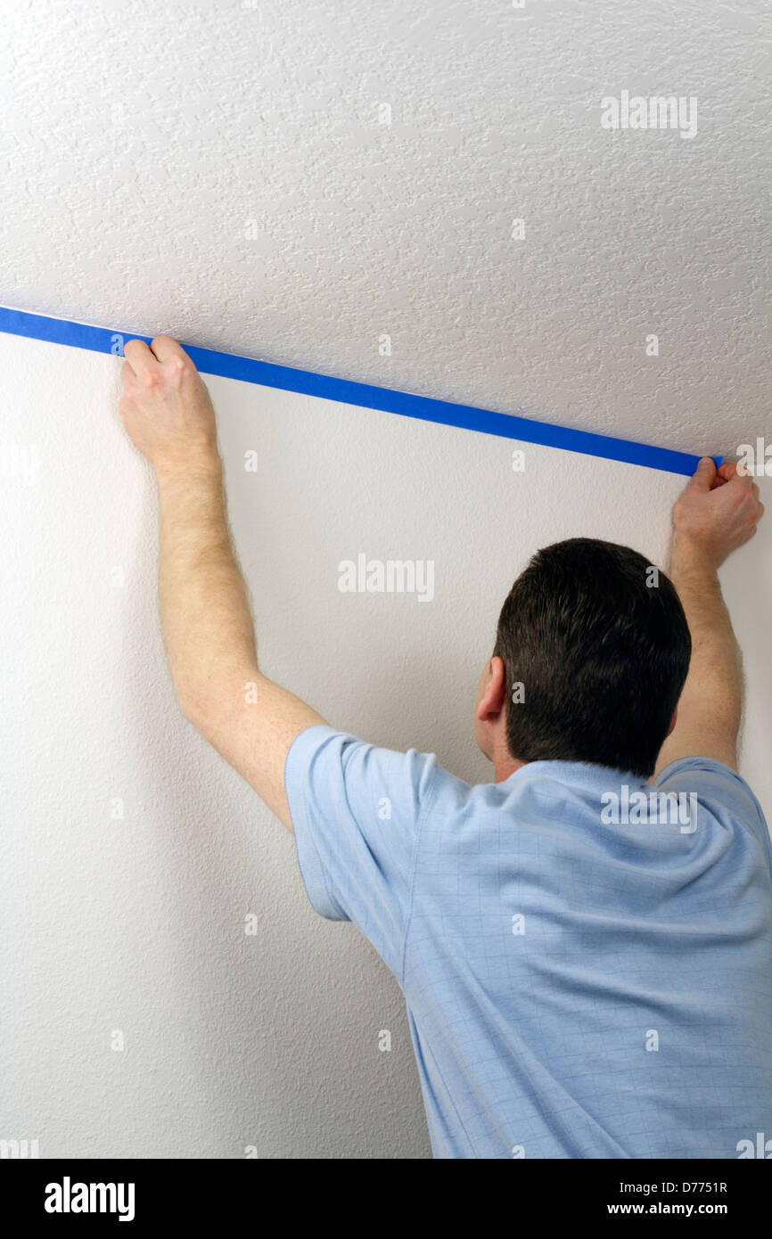 Man Using Painters Tape Adult Male Pressing Blue Painter S