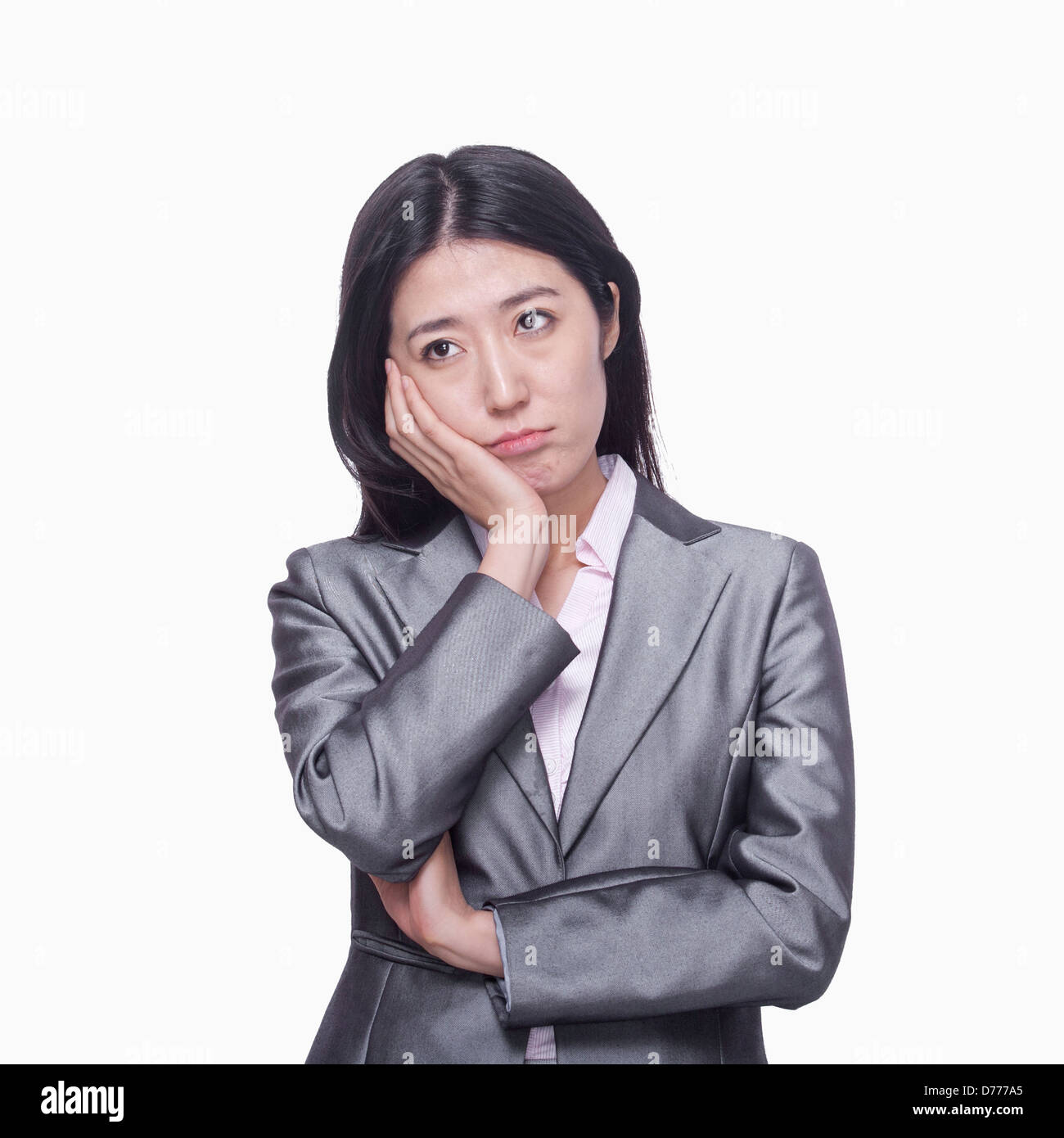 Businesswoman with sad expression Stock Photo