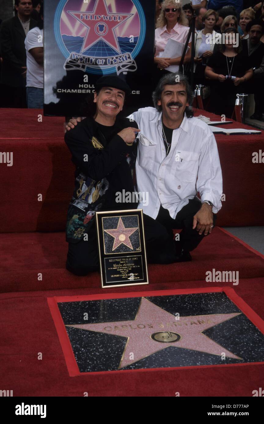 CARLOS SANTANA with his brother Jorge Santana.Carlos Santana honored with Hollywood walk of Fame Star 1998.k13055fb. Credit Image Fitzroy Barrett Globe Photos ZUMAPRESS Stock Photo Alamy