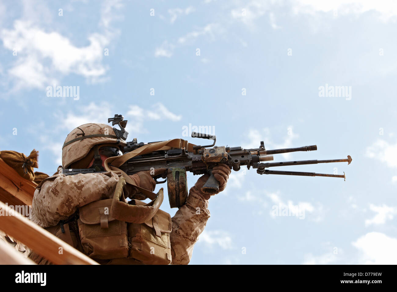 U.S. Marine Aims M249 Squad Automatic Weapon or SAW Helmand Province Afghanistan. Stock Photo