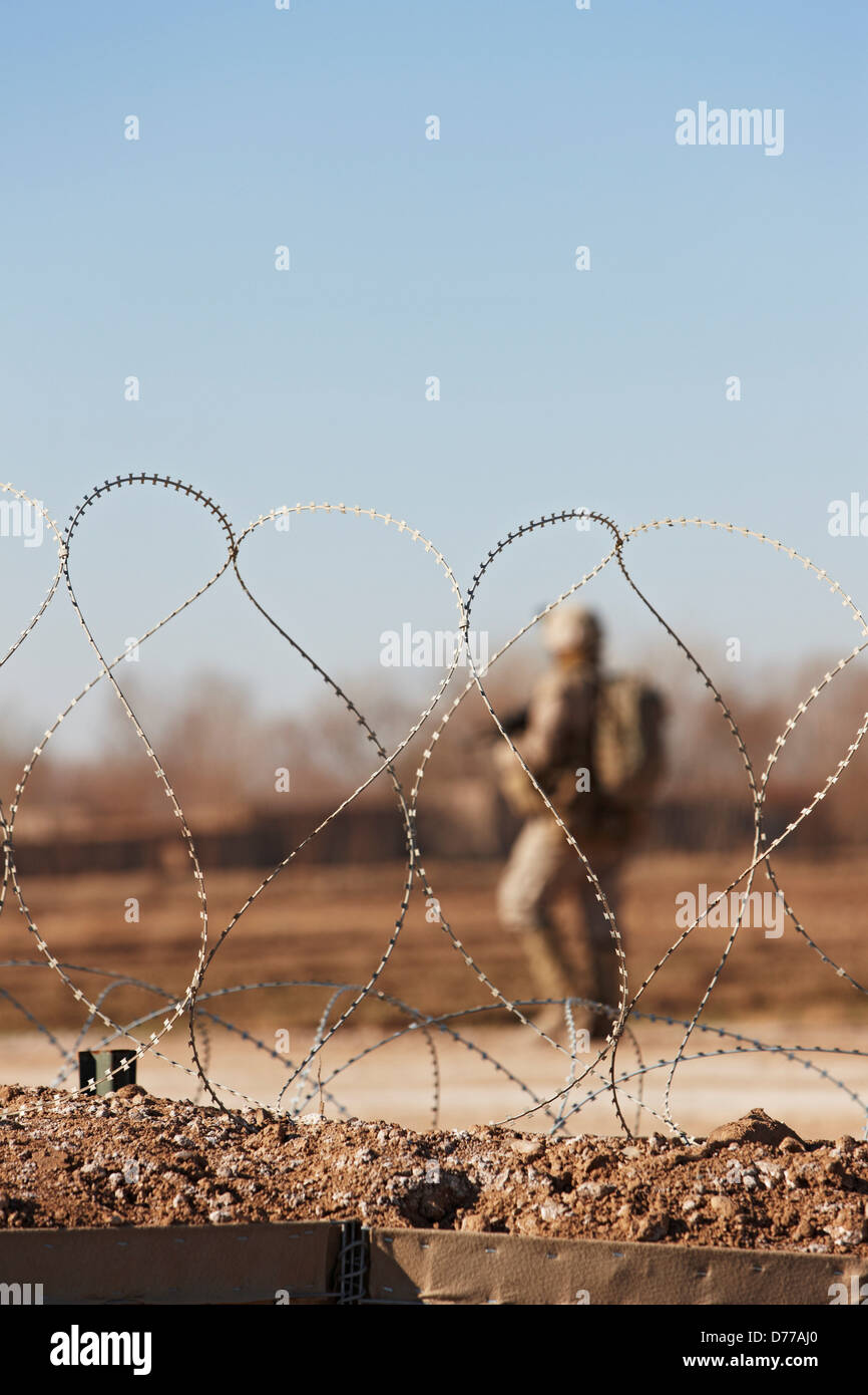 Barbed wire soldier hires stock photography and images Alamy