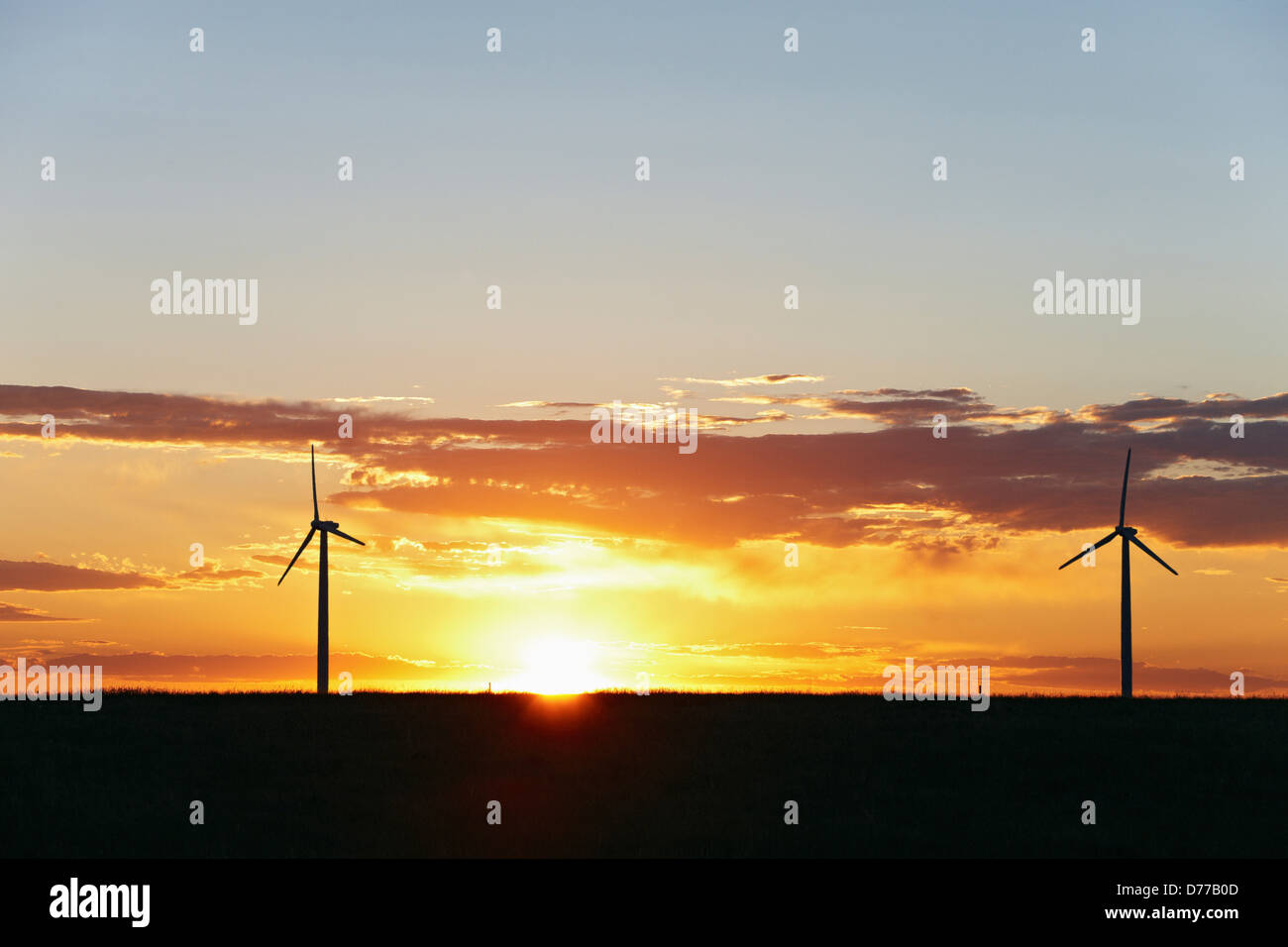 Silhouettes Wind Turbines at Sunset Stock Photo - Alamy