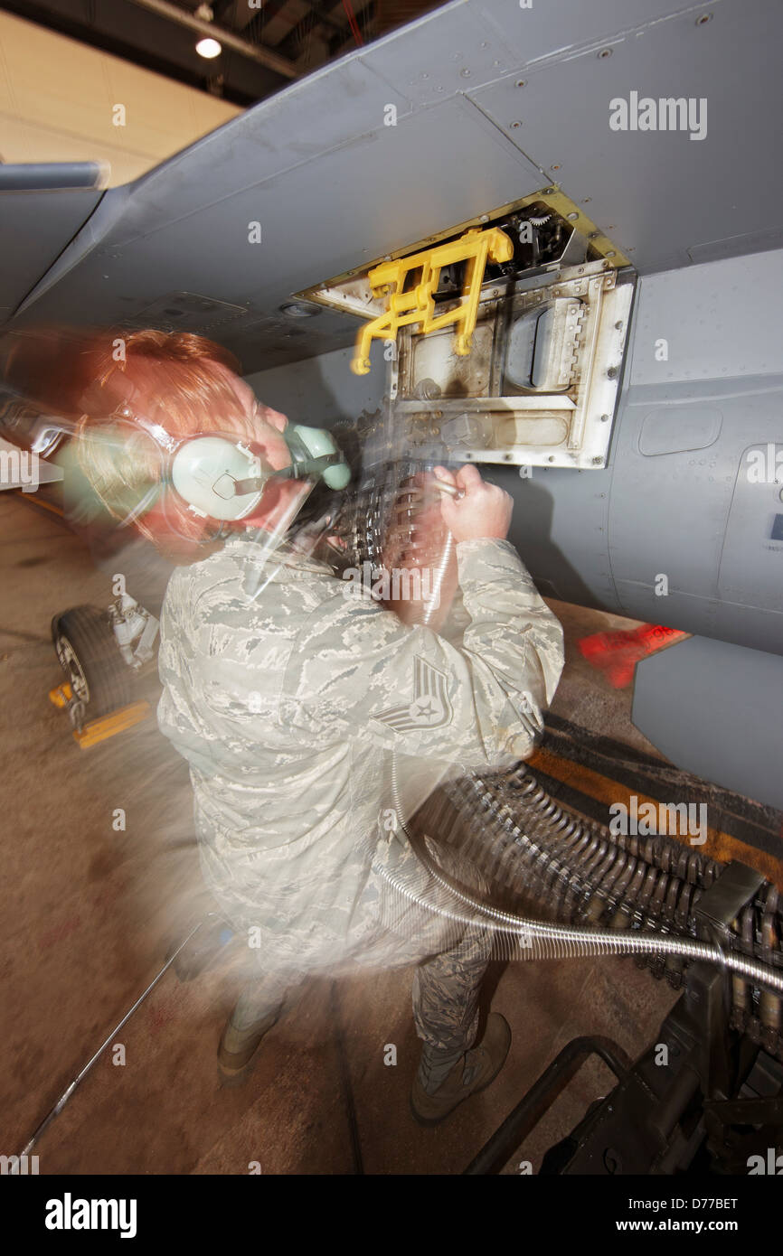 Ground Crew Member Loads 20mm Rounds Bullets into Gun F-16 Stock Photo