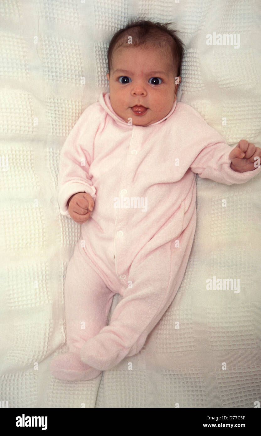 Baby Girl In Pink Babygro Stock Photo Alamy Baby Girl In Pink Babygro Stock Photo Alamy