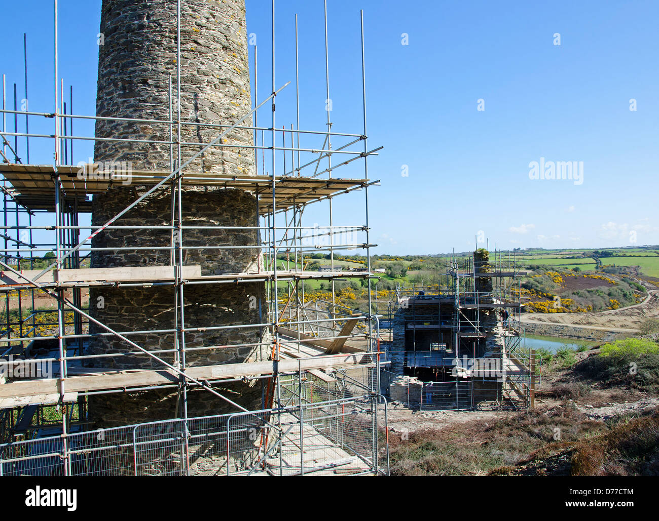 Old tin mine buildings undergoing restoration work near Redruth in Cornwall, UK Stock Photo