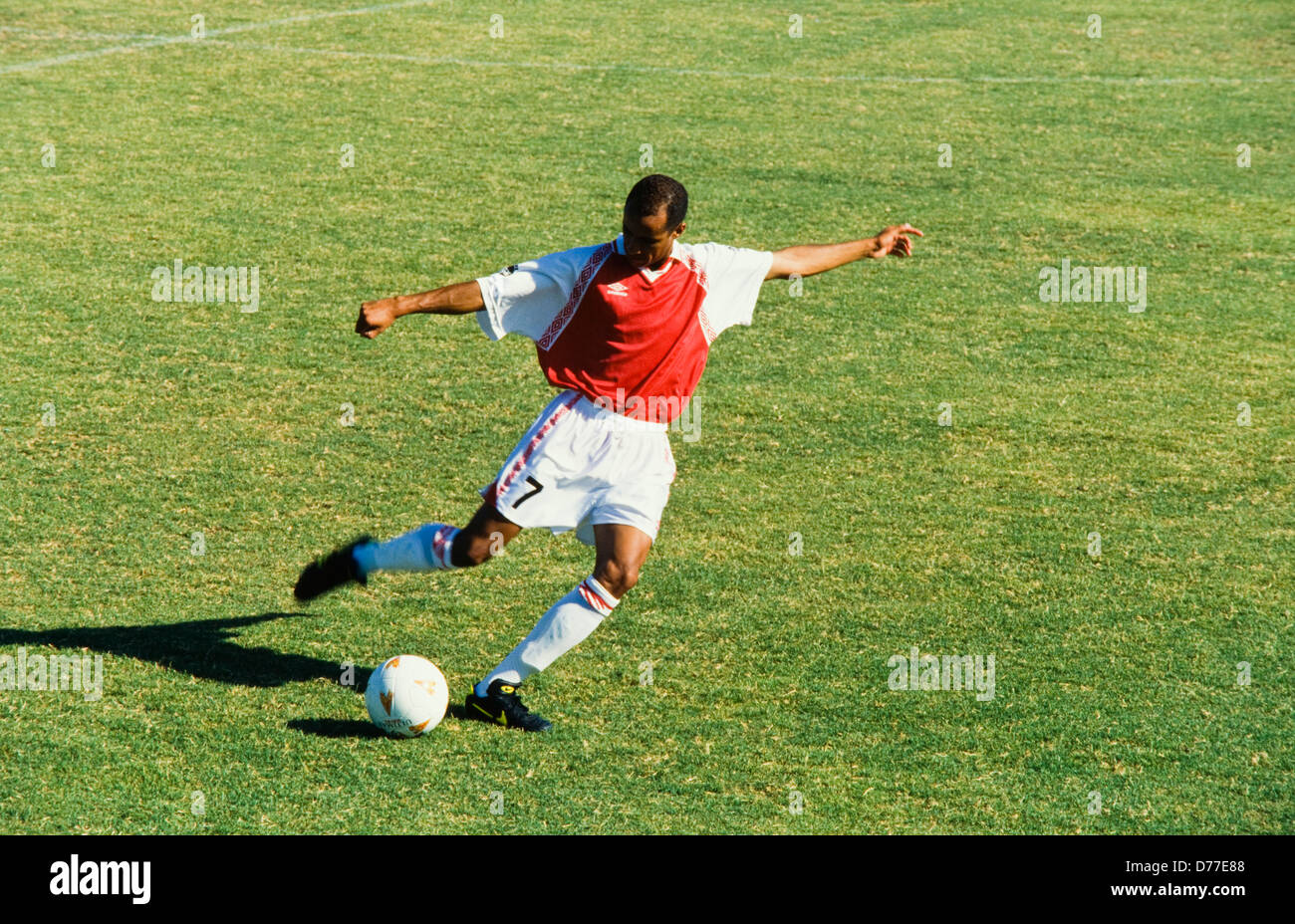 Soccer player alone with ball, shot on goal, Miami Stock Photo - Alamy