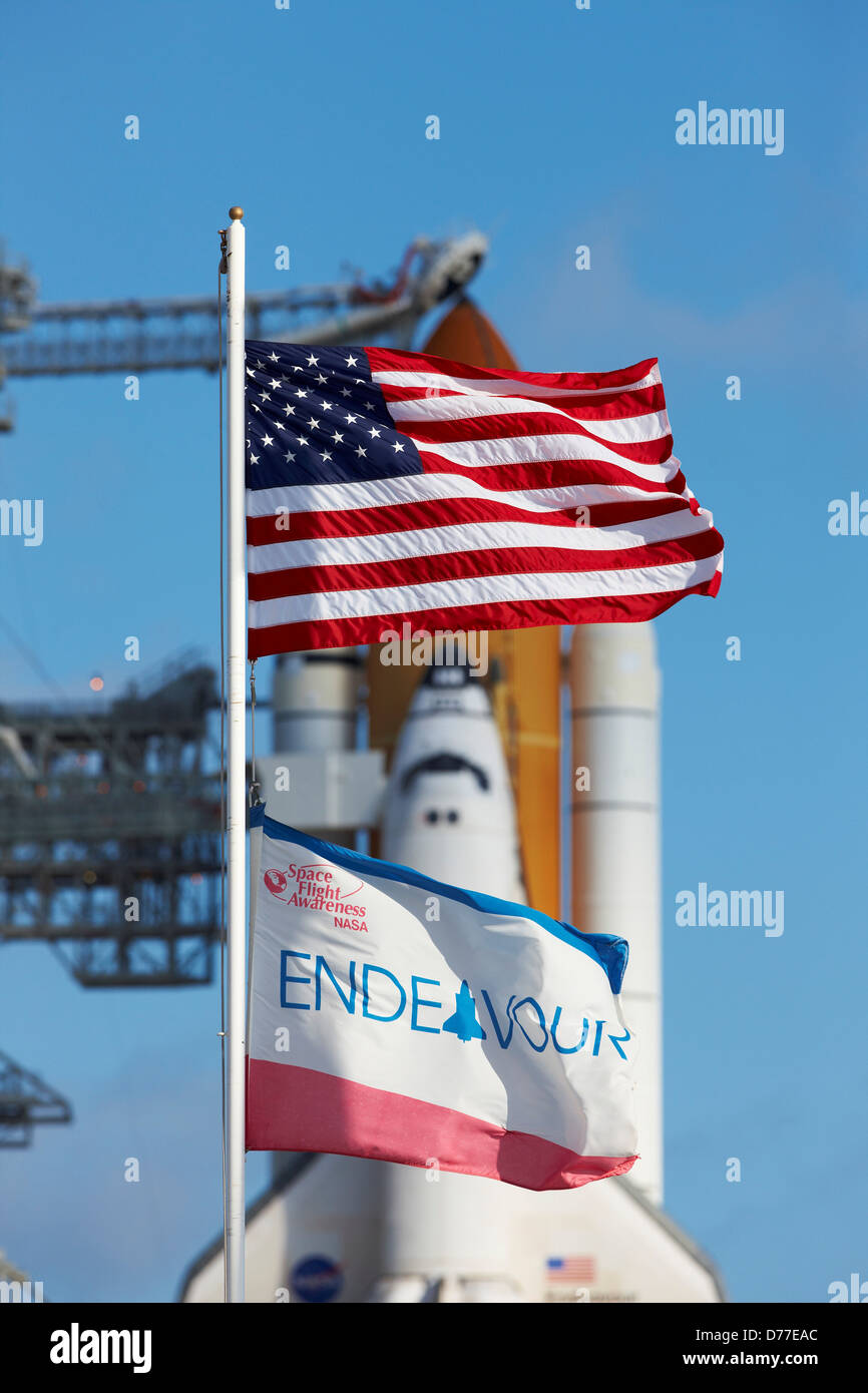 American flag Space Shuttle Endeavour Flag in foreground frame cockpit Space Shuttle Endeavour ready to launch on STS-130 Pad Stock Photo