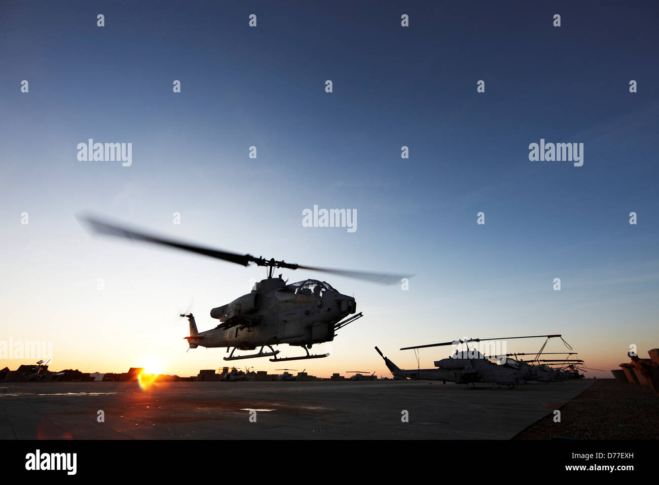 United States Marine Corps AH-1W SuperCobra attack helicopter launches on combat operation in Helmand Province Afghanistan Stock Photo