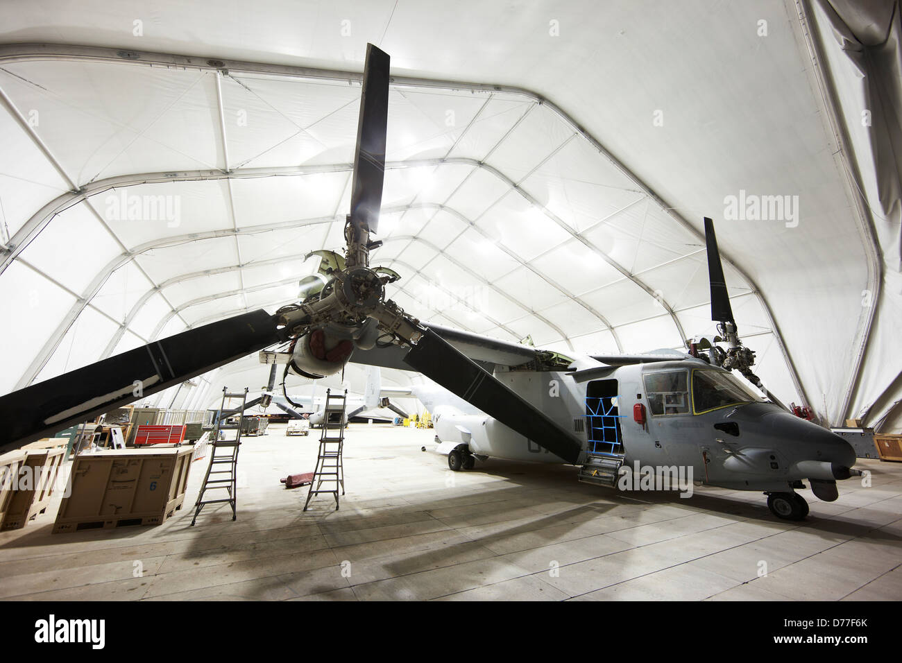 United States Marine Corps MV-22 in expeditionary hangar maintenance Camp Bastion Helmand Province Afghanistan Stock Photo