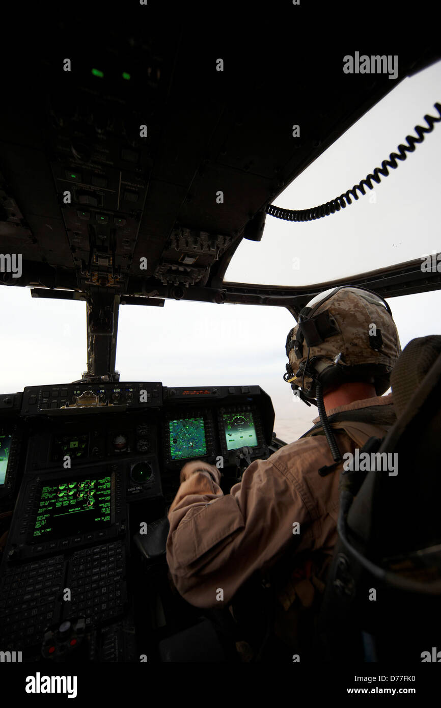 United States Marine Corps aviator inside cockpit MV22 Osprey Helmand