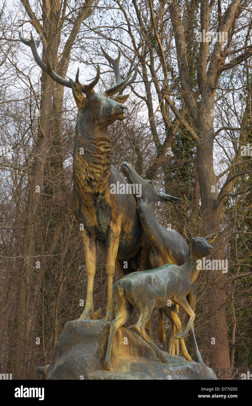 A Large bronze sculpture of a stag with his doe and a fawn, by the sculptor George Gardet, in the Parc de Sceaux. South of Paris. France. Stock Photo