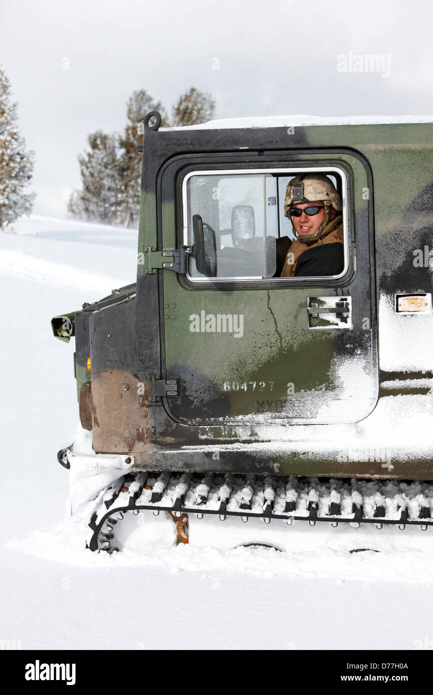 USA California Bridgeport Mountain Warfare Training Center Bandvagn 206 being driven through snow Stock Photo