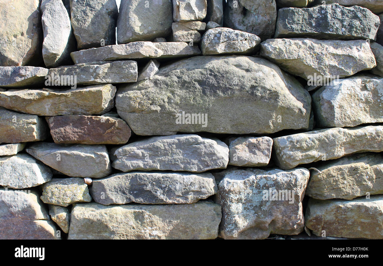 Closeup of traditional dry stone wall in countryside. Stock Photo