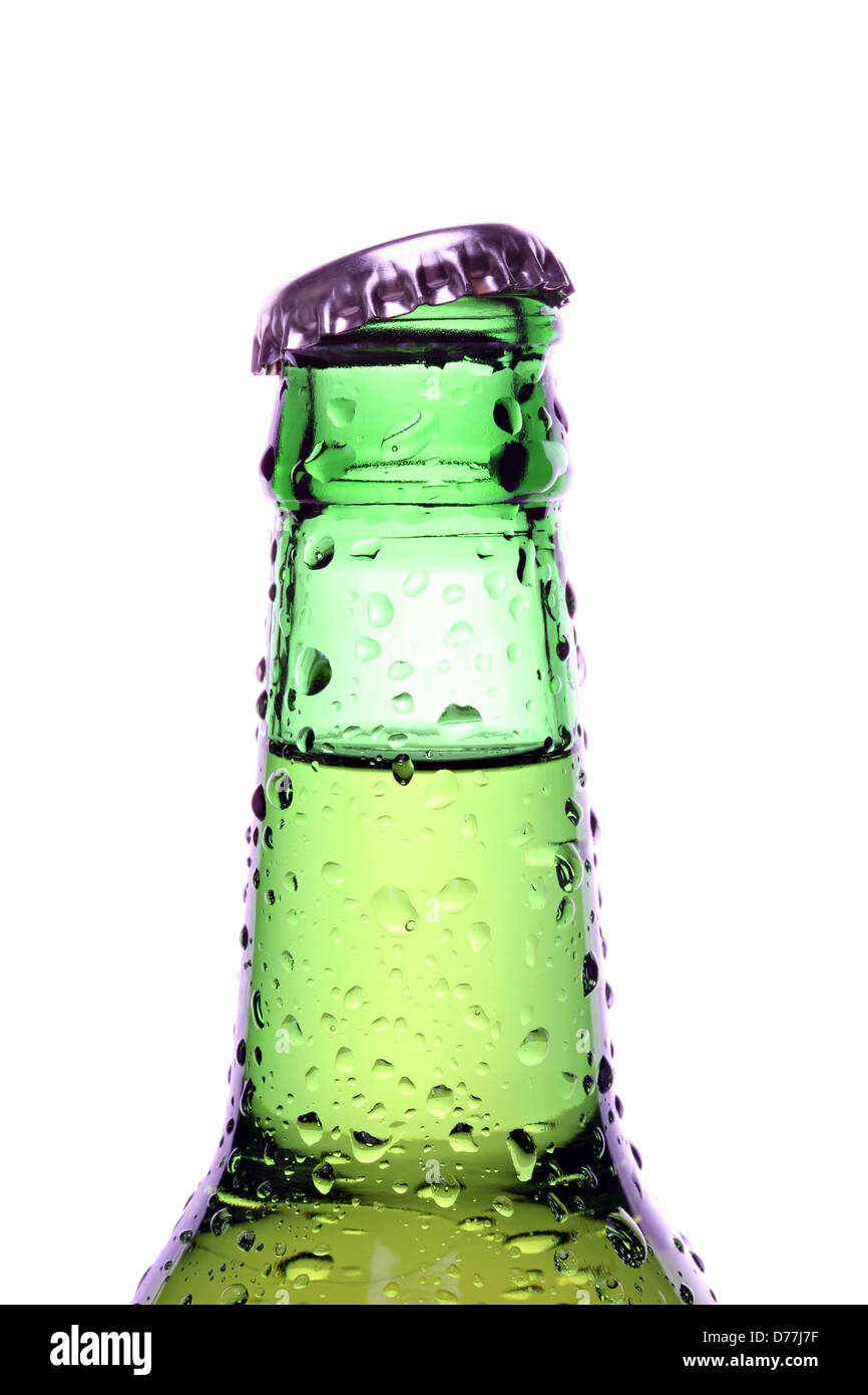 beer bottle with water droplets, green bottle closeup isolated on white Stock Photo