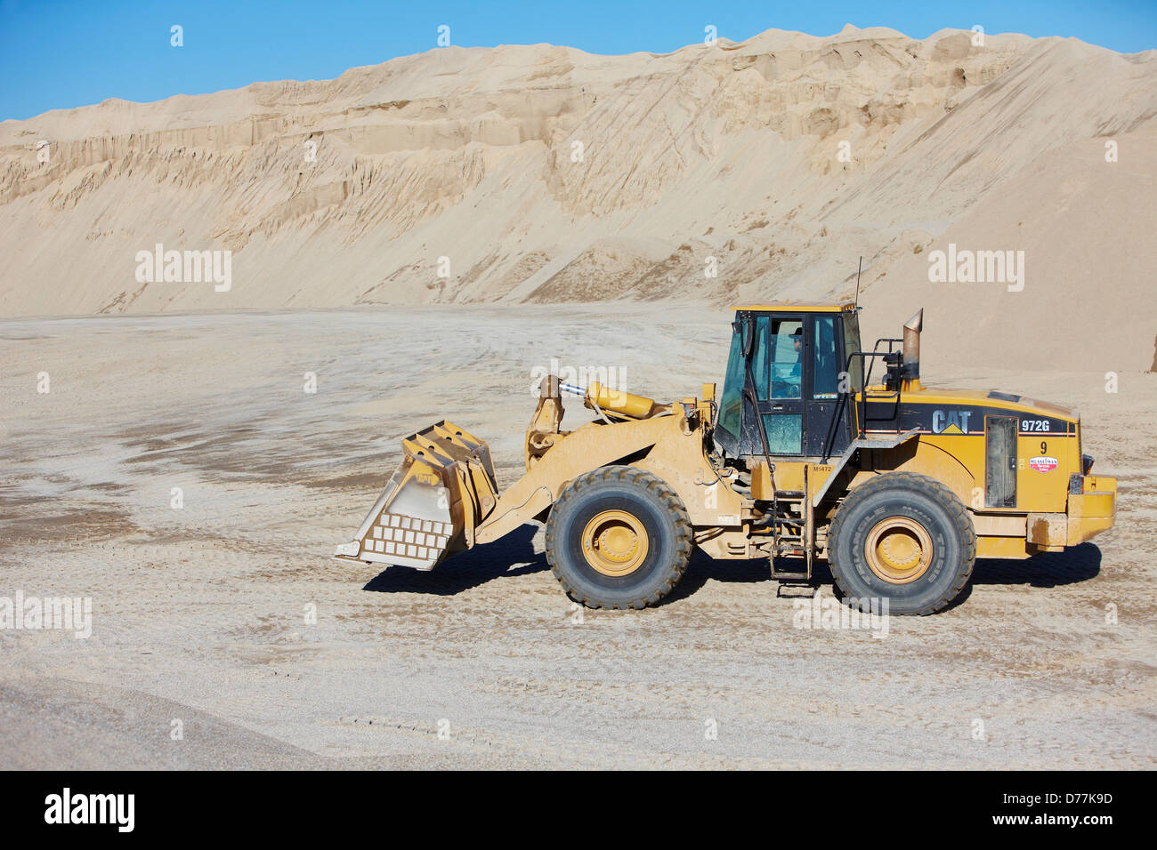 USA Oklahoma Picher Front end loader moves chat toxic by-product underground lead mining Stock Photo