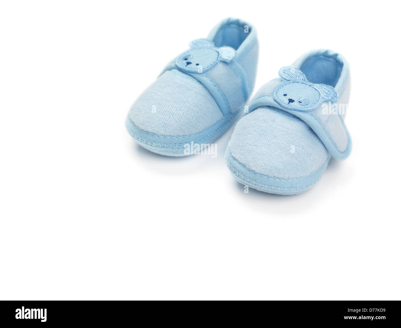 Baby boy blue shoes isolated on white 