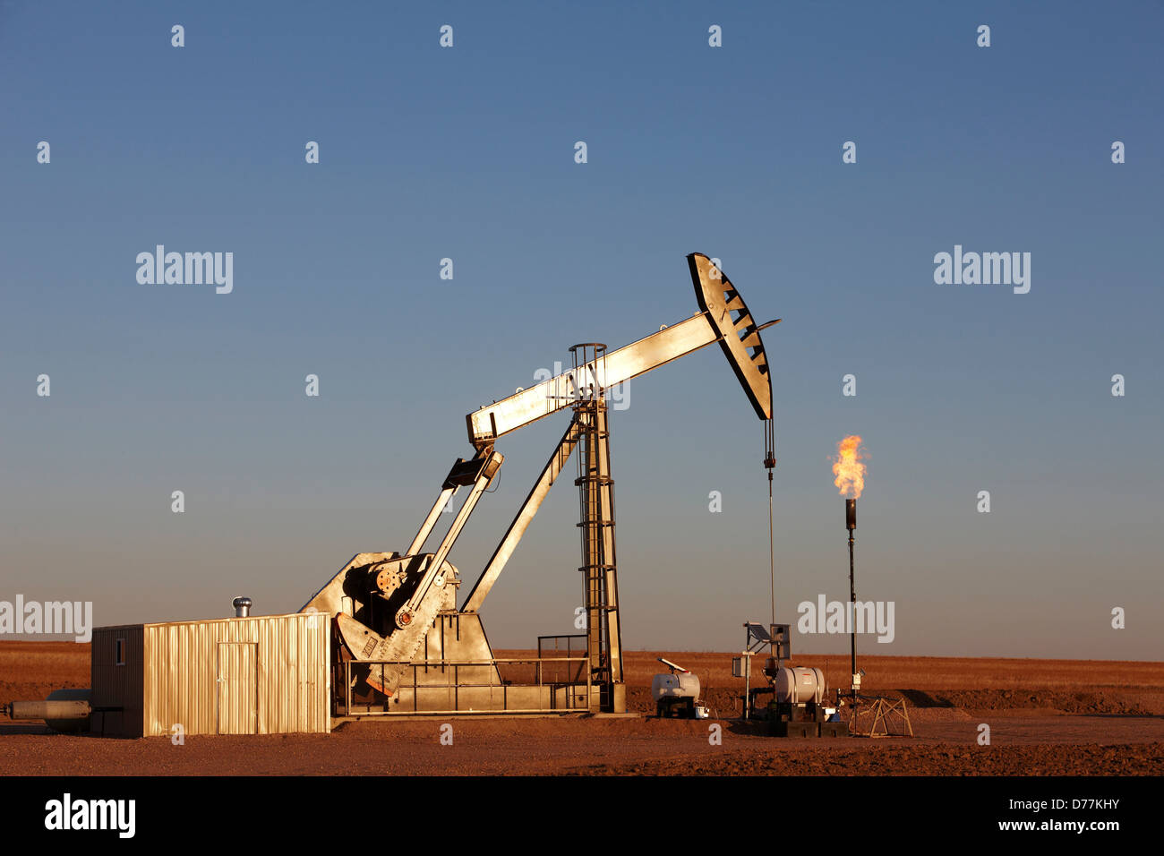 Oil well pumpjack pump jack gas flare flare stack eastern plains