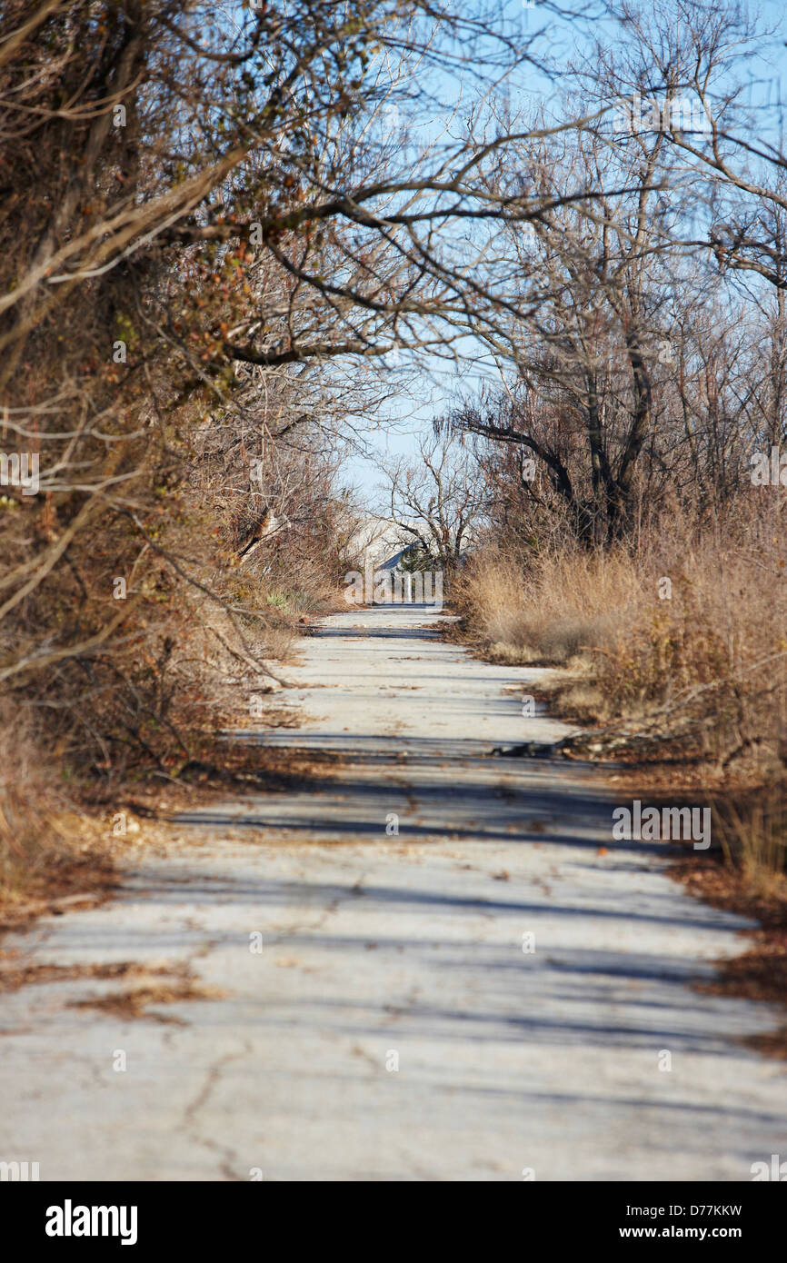 Empty deserted road leading to chat pile toxic byproduct underground mining lead Picher
