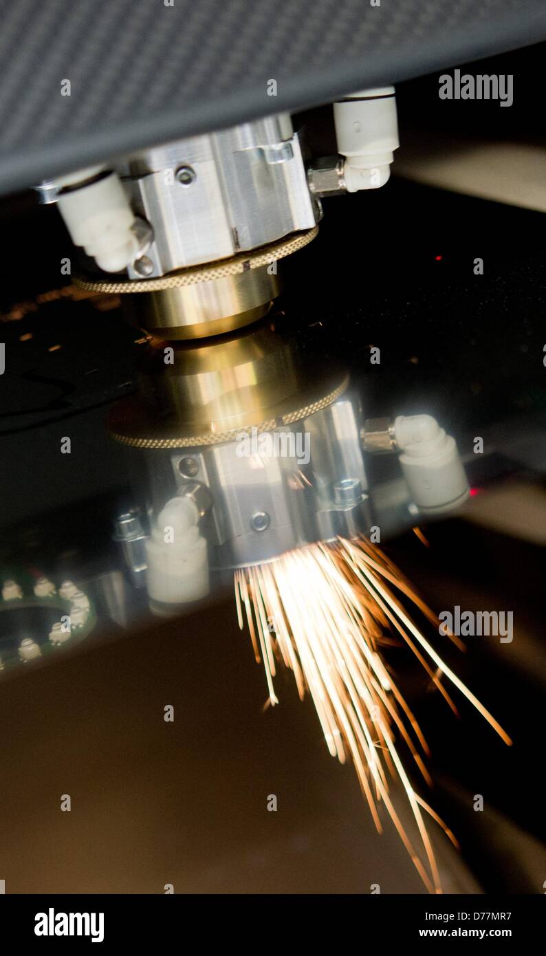 A high-precision laser from LPKF Laser & Electronics cuts extremely precise  metal structures for test purposes in the company's factory in Garbsen,  Germany, 22 April 2013. Two out of three machine manufacturers