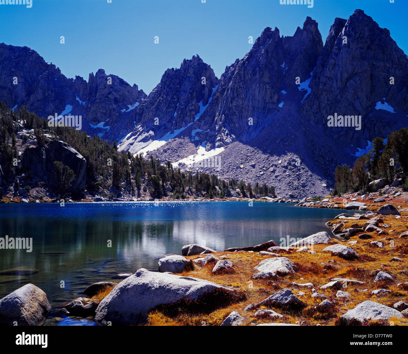 The Kearsarge Pinnacles rising above Kearsarge Lakes Sierra Nevada Kings Canyon National Park California. Stock Photo