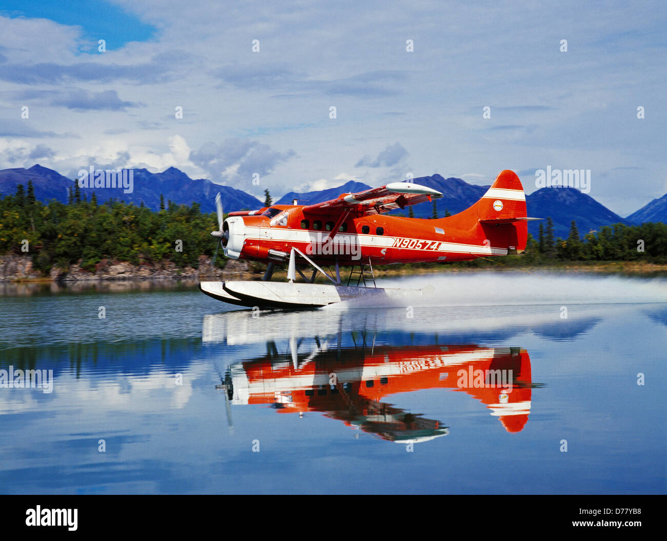 Lake Clark Air Service's de Havilland DHC3 Otter landing in channel Hardenburg Bay Port Alsworth