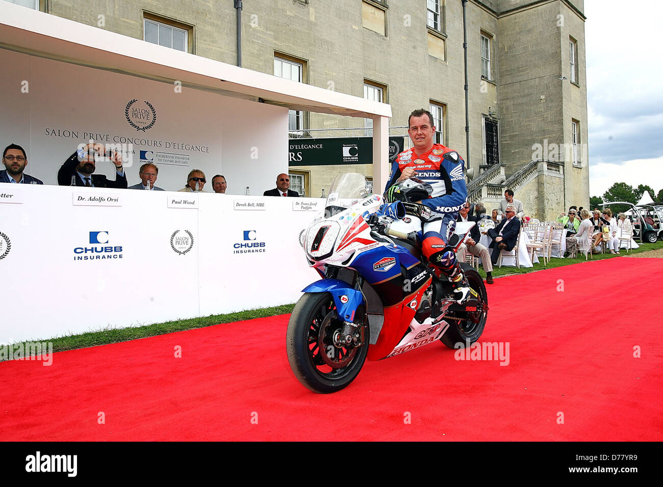 John McGuinness Isle of Man TT champion honoured today at the last day of the annual three day 'Salon Prive' luxury and Stock Photo