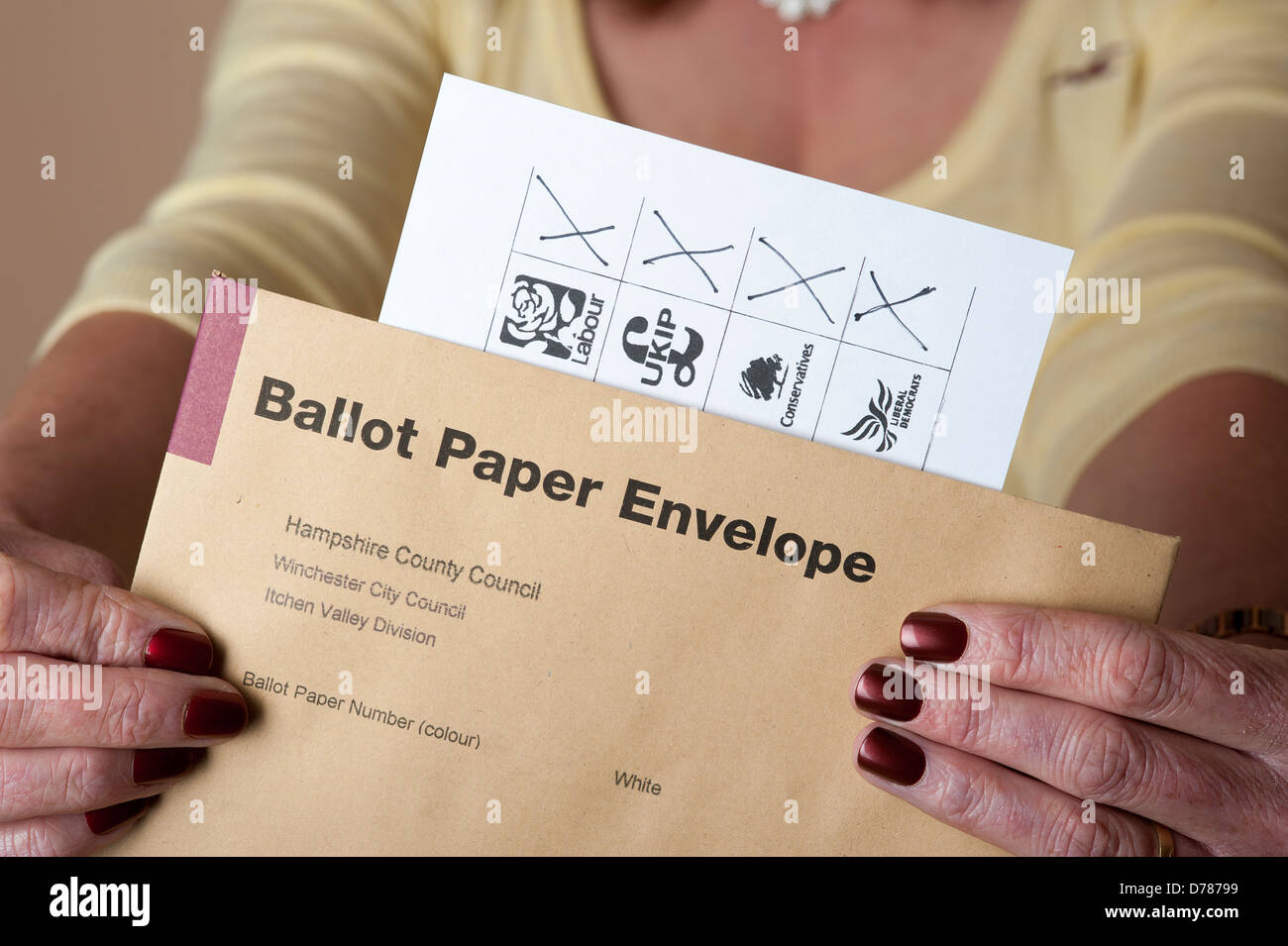 Spoiled voting paper where elector has marked a cross for each of four candidates spoiled vote Stock Photo