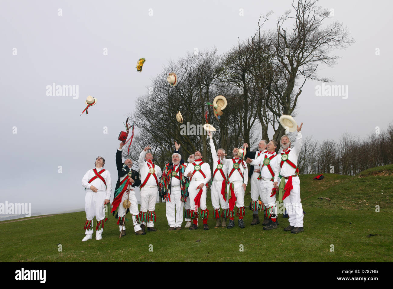 Chanctonbury Ring Morris Men celebrate May Day (1st May) with their traditional singing and dancing at Chanctonbury Ring, atop Chanctonbury Hill, East Sussex. Stock Photo